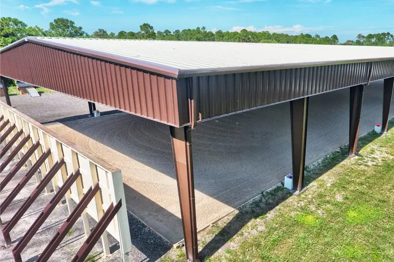 Metal horse barn with steel framing for equine housing