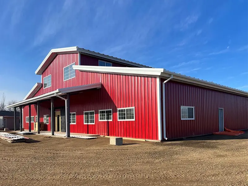 Steel agricultural barn designed with side access doors for flexible farm storage and equipment movement.