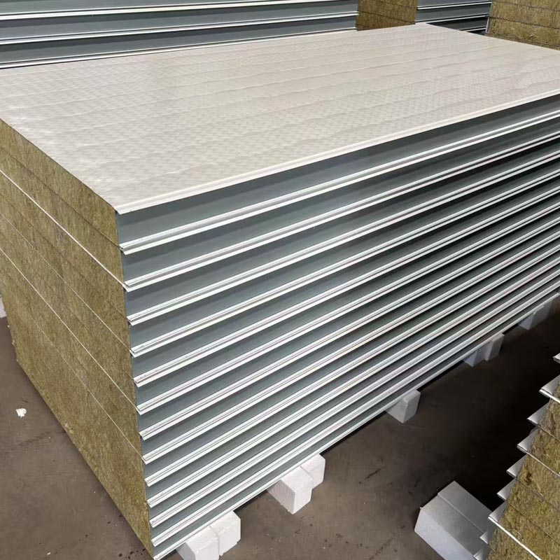 Stacked insulated sandwich wall panels packed on pallets for export shipment