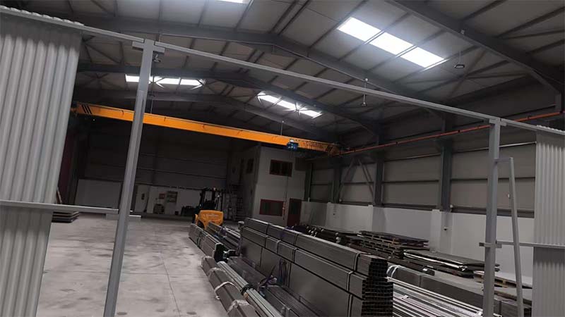 Interior view of the Australia steel warehouse showing open space and steel roof structure
