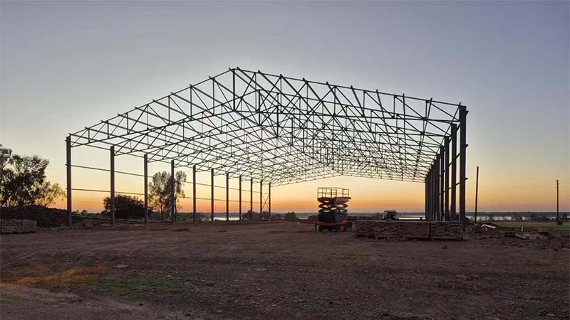 On-site erection of the steel warehouse frame structure during installation in Australia