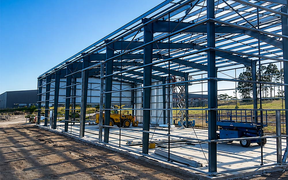 Side view of the steel frame structure during construction of the prefabricated food warehouse project in Australia