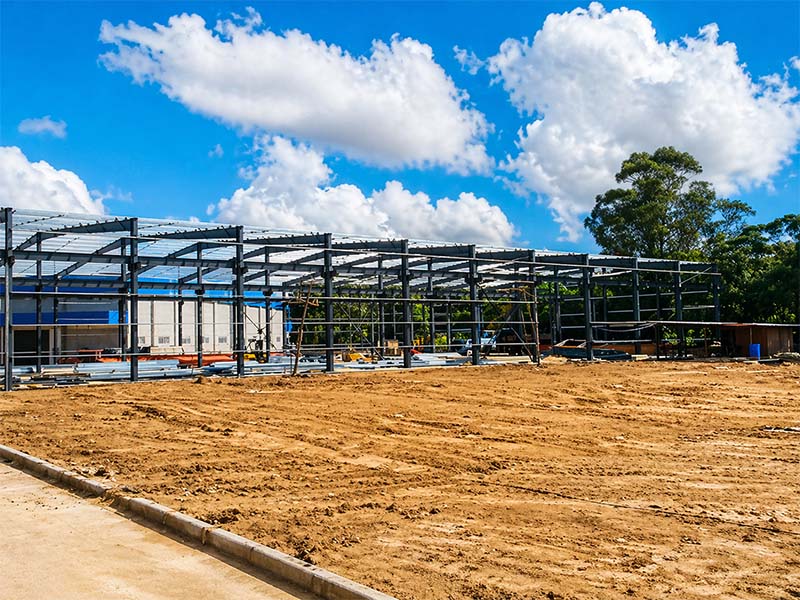 Steel frame construction progress of a factory building project in Brazil