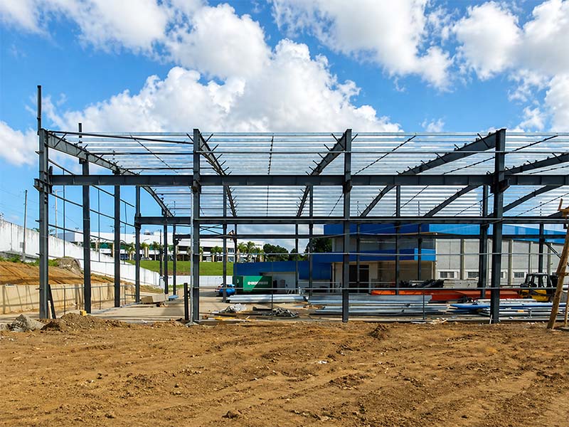 Side view of the steel structure under construction for a factory project in Brazil