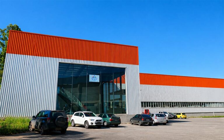 Main entrance view of the completed steel structure factory building project in Brazil