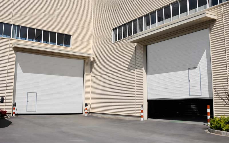 Industrial door systems for steel building applications